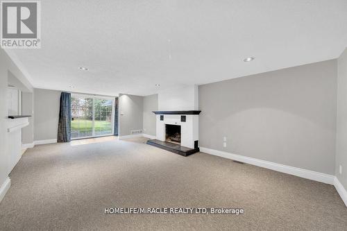 10 Houghton Blvd, Markham, ON - Indoor With Fireplace