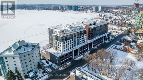 521 - 185 Dunlop Street E, Barrie, ON - Outdoor With Balcony With Facade