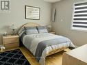 21 - 100 Laguna Parkway, Ramara, ON  - Indoor Photo Showing Bedroom 