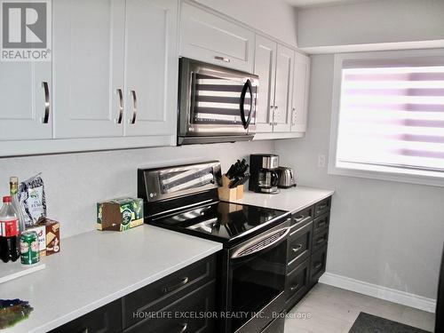 21 - 100 Laguna Parkway, Ramara, ON - Indoor Photo Showing Kitchen