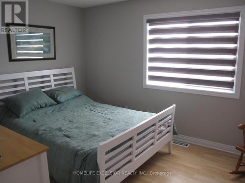 21 - 100 Laguna Parkway, Ramara, ON - Indoor Photo Showing Bedroom