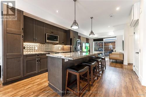 #209 -17 Baldwin St N, Whitby, ON - Indoor Photo Showing Kitchen With Upgraded Kitchen