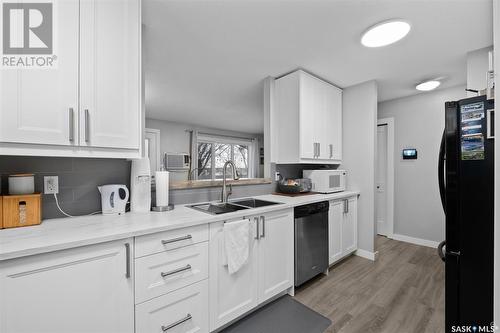 6 20 18Th Street W, Prince Albert, SK - Indoor Photo Showing Kitchen With Double Sink