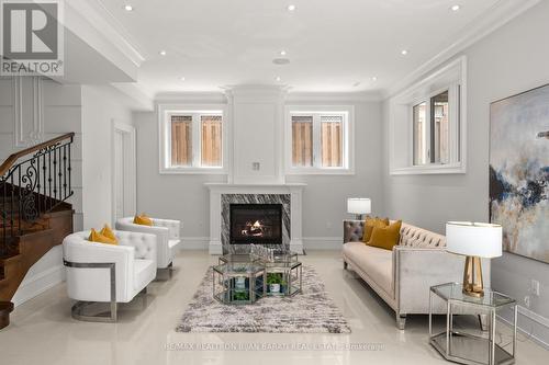 6 Harnish Cres, Toronto, ON - Indoor Photo Showing Living Room With Fireplace