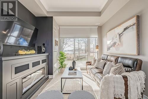 #129 -3500 Lakeshore Rd W, Oakville, ON - Indoor Photo Showing Living Room With Fireplace