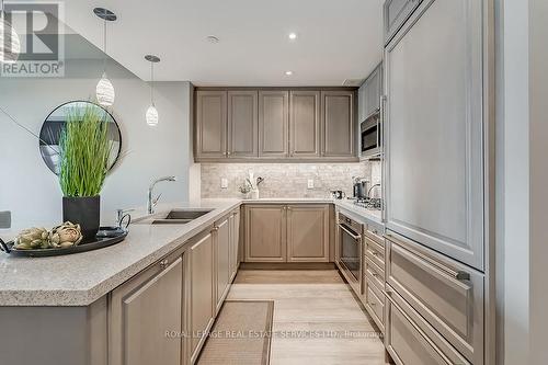 #129 -3500 Lakeshore Rd W, Oakville, ON - Indoor Photo Showing Kitchen With Double Sink With Upgraded Kitchen