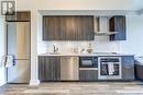 513 - 20 Shore Breeze Drive, Toronto, ON  - Indoor Photo Showing Kitchen With Upgraded Kitchen 