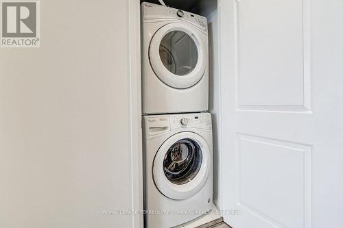 #513 -20 Shore Breeze Dr, Toronto, ON - Indoor Photo Showing Laundry Room