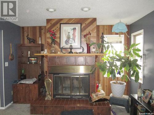 529 6Th Avenue E, Assiniboia, SK - Indoor Photo Showing Living Room With Fireplace