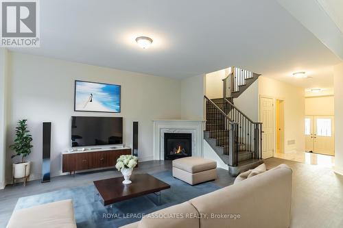 12 Creedon Crescent, Ajax, ON - Indoor Photo Showing Living Room With Fireplace