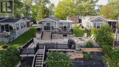 486 Cty Rd 18 - 91 Cherry Beach Lane, Prince Edward County, ON - Outdoor With Deck Patio Veranda