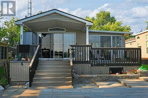 486 Cty Rd 18 - 91 Cherry Beach Lane, Prince Edward County, ON - Outdoor With Deck Patio Veranda