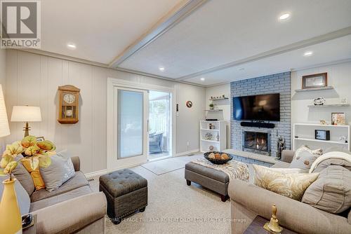 170 Guildford Cres, London, ON - Indoor Photo Showing Living Room With Fireplace