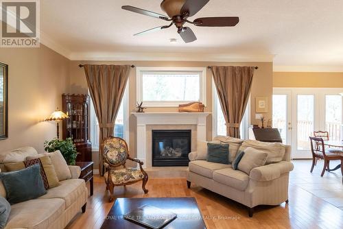 78 Blackburn Cres, Middlesex Centre, ON - Indoor Photo Showing Living Room With Fireplace