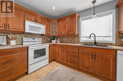 26 Empire Boulevard, Brighton, ON - Indoor Photo Showing Kitchen With Double Sink