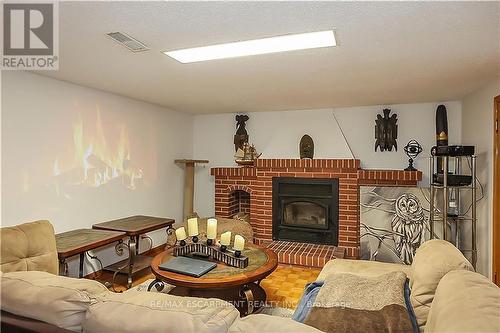 68 Montmorency Dr, Hamilton, ON - Indoor Photo Showing Living Room With Fireplace