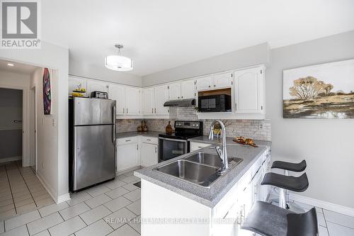 12 Halstead Rd, Clarington, ON - Indoor Photo Showing Kitchen With Double Sink