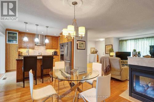 16 Plainsman Road, Mississauga, ON - Indoor Photo Showing Dining Room With Fireplace