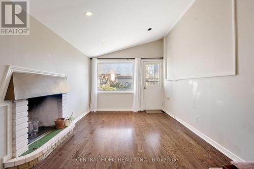95 Nipigon Ave, Toronto, ON - Indoor Photo Showing Other Room With Fireplace
