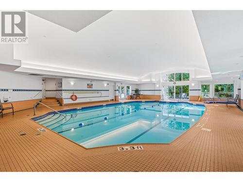 4520 Gallaghers Lookout Unit# 6, Kelowna, BC - Indoor Photo Showing Other Room With In Ground Pool