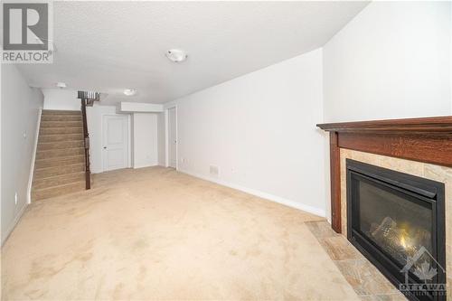 220 Gossamer Street, Orleans, ON - Indoor Photo Showing Other Room With Fireplace
