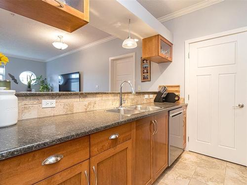 206-7088 West Saanich Rd, Central Saanich, BC - Indoor Photo Showing Kitchen With Double Sink