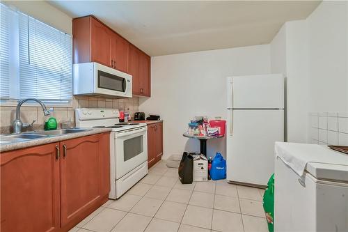 1597 King Street E, Hamilton, ON - Indoor Photo Showing Kitchen With Double Sink
