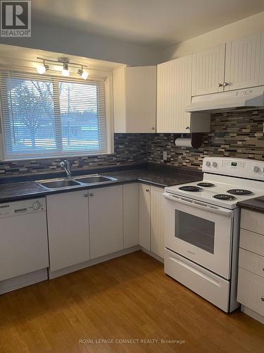 #Main -375 Lawson Rd, Toronto, ON - Indoor Photo Showing Kitchen With Double Sink