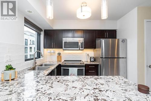 #709 -138 Widdicombe Hill Blvd, Toronto, ON - Indoor Photo Showing Kitchen With Double Sink With Upgraded Kitchen