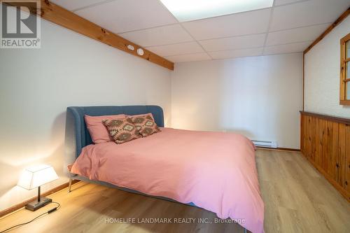 1245 Mortimers Point Road, Muskoka Lakes, ON - Indoor Photo Showing Bedroom