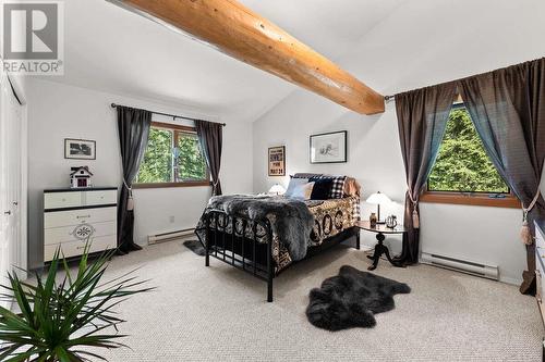7695 Twin Lakes Road, Bridge Lake, BC - Indoor Photo Showing Bedroom