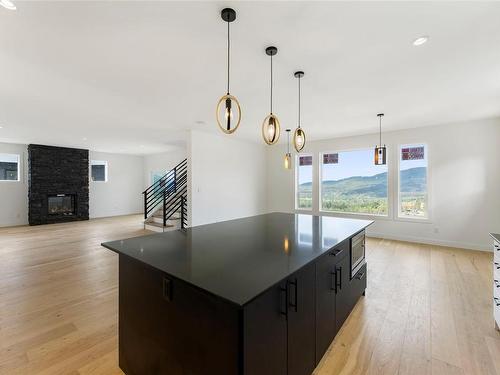 1268 Kingsview Rd, Duncan, BC - Indoor Photo Showing Kitchen With Fireplace