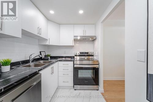 #1513 -145 Hillcrest Ave, Mississauga, ON - Indoor Photo Showing Kitchen With Stainless Steel Kitchen With Double Sink