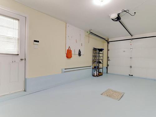 Garage - 7455 Rue Lasnier, Brossard, QC - Indoor Photo Showing Garage