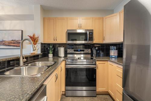 1213 - 205 Third Avenue, Invermere, BC - Indoor Photo Showing Kitchen With Double Sink