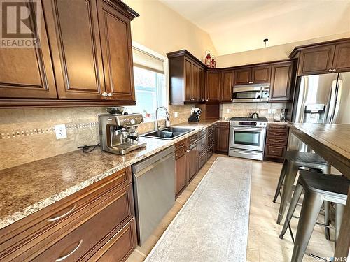 10306 Bunce Crescent, North Battleford, SK - Indoor Photo Showing Kitchen With Stainless Steel Kitchen With Double Sink