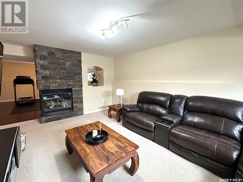 10306 Bunce Crescent, North Battleford, SK - Indoor Photo Showing Living Room With Fireplace