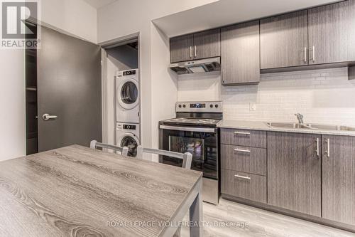 B404 - 275 Larch Street, Waterloo, ON - Indoor Photo Showing Kitchen With Double Sink