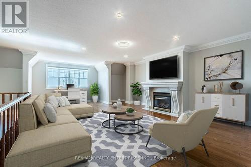#24 -58 St Lawrence Dr, Mississauga, ON - Indoor Photo Showing Living Room With Fireplace