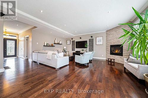 18 Black Creek Trail, Springwater, ON - Indoor Photo Showing Living Room With Fireplace