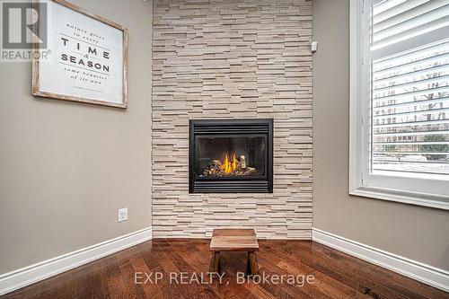 18 Black Creek Trail, Springwater, ON - Indoor With Fireplace