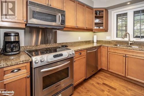 3876 Muskoka Road 118 W Unit# Carling 10-W3, Port Carling, ON - Indoor Photo Showing Kitchen With Double Sink