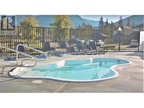 400 Bighorn Boulevard Unit# 415 Q, Radium Hot Springs, BC - Outdoor With In Ground Pool