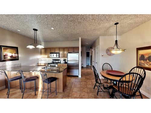 415 Q - 400 Bighorn Boulevard, Radium Hot Springs, BC - Indoor Photo Showing Dining Room