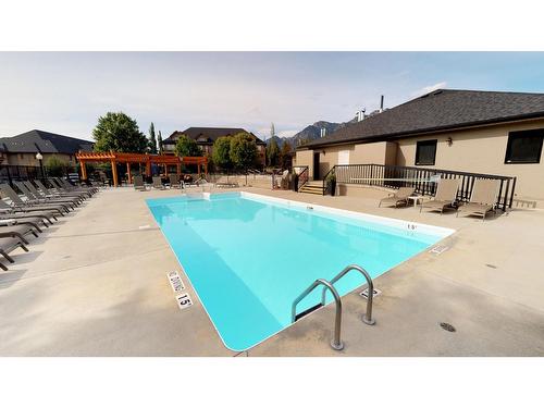 415 Q - 400 Bighorn Boulevard, Radium Hot Springs, BC - Outdoor With In Ground Pool With Deck Patio Veranda