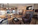 400 Bighorn Boulevard Unit# 415 Q, Radium Hot Springs, BC  - Indoor Photo Showing Living Room With Fireplace 