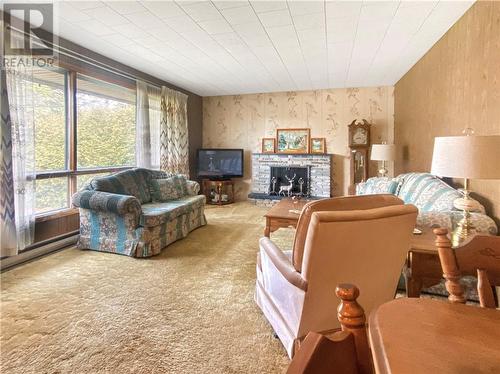 6227 King Street, Mindemoya, Manitoulin Island, ON - Indoor Photo Showing Living Room With Fireplace