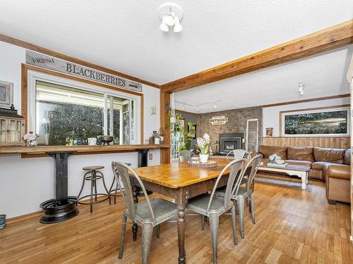 593 Scollard Rd, Mill Bay, BC - Indoor Photo Showing Dining Room With Fireplace