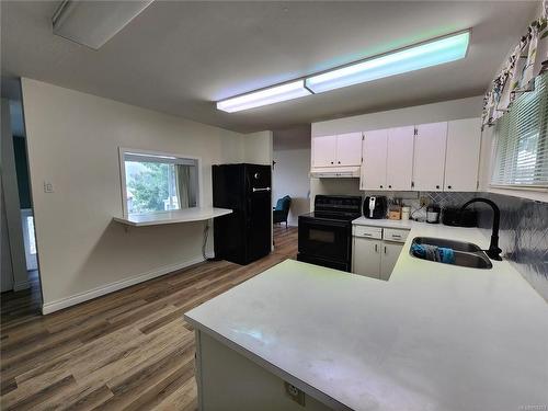 925 Haida Ave, Port Alice, BC - Indoor Photo Showing Kitchen With Double Sink