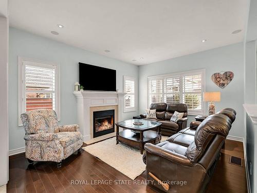 2 Hewitt Dr, Grimsby, ON - Indoor Photo Showing Living Room With Fireplace